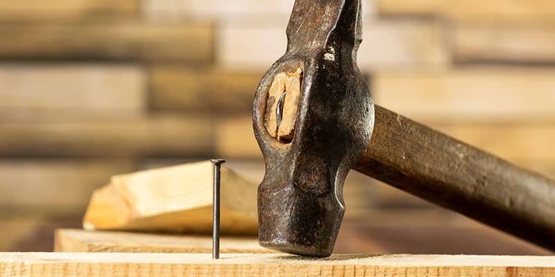 Hammer and nails repairing pallet